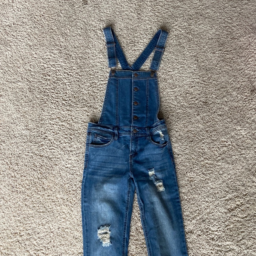 Skinny blue jean overalls